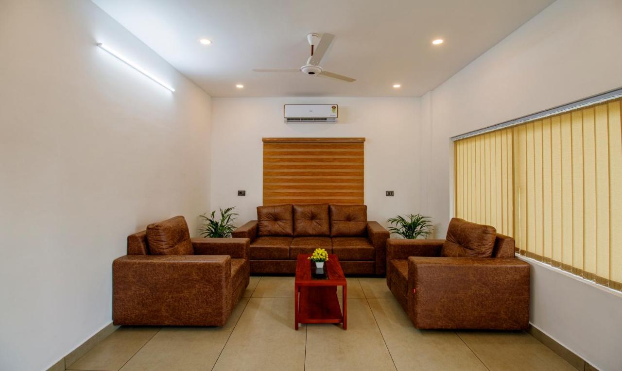 Treebo Amigos Residency Cochin Airport Hotel Kochi Екстер'єр фото