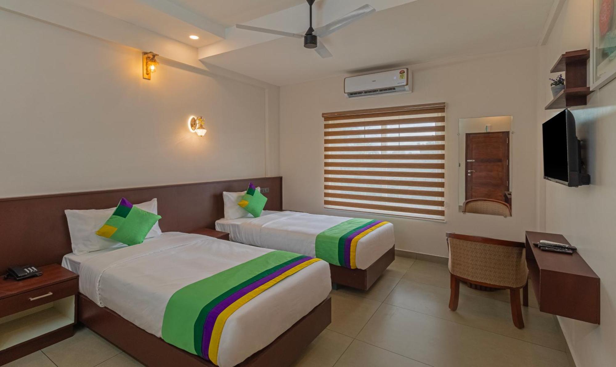 Treebo Amigos Residency Cochin Airport Hotel Kochi Екстер'єр фото